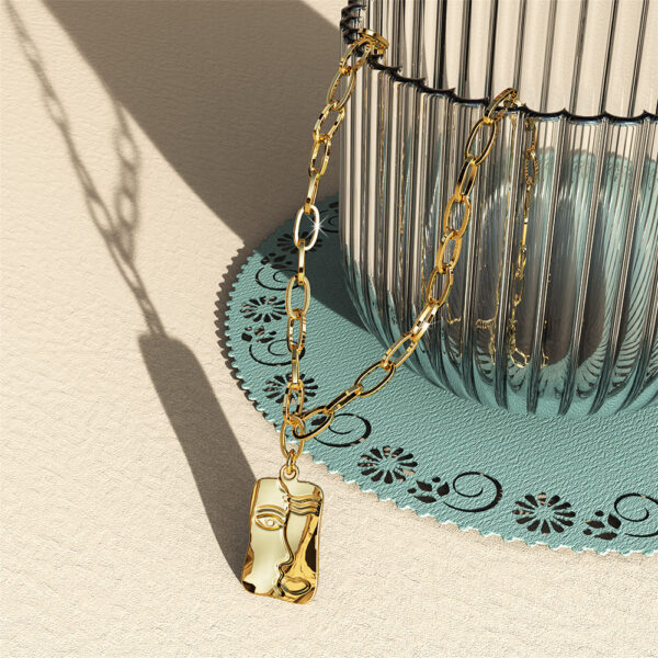 Abstract Face Necklace in Gold - Image 3
