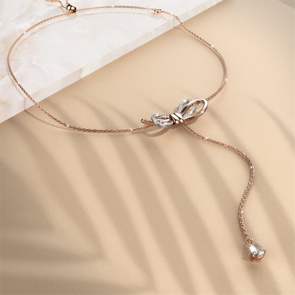 Eternal Knot Slider Bracelet Embellished with SWAROVSKI® Crystals in Dual Tone Gold - Image 3